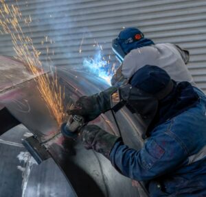 Welded manufacturing in the steel factory. Manufacturing engineering, or the manufacturing process, are the steps through which raw materials are transformed into a final product.