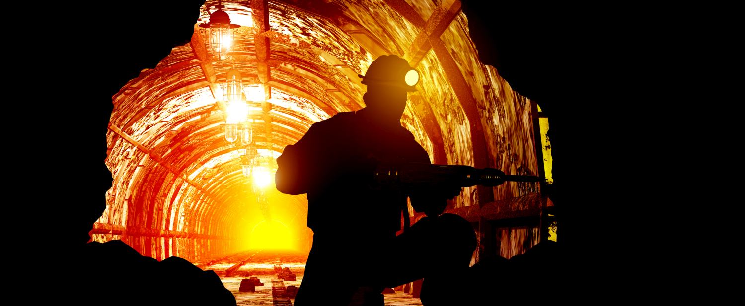 Silhouettes of worker working safely in the mine.